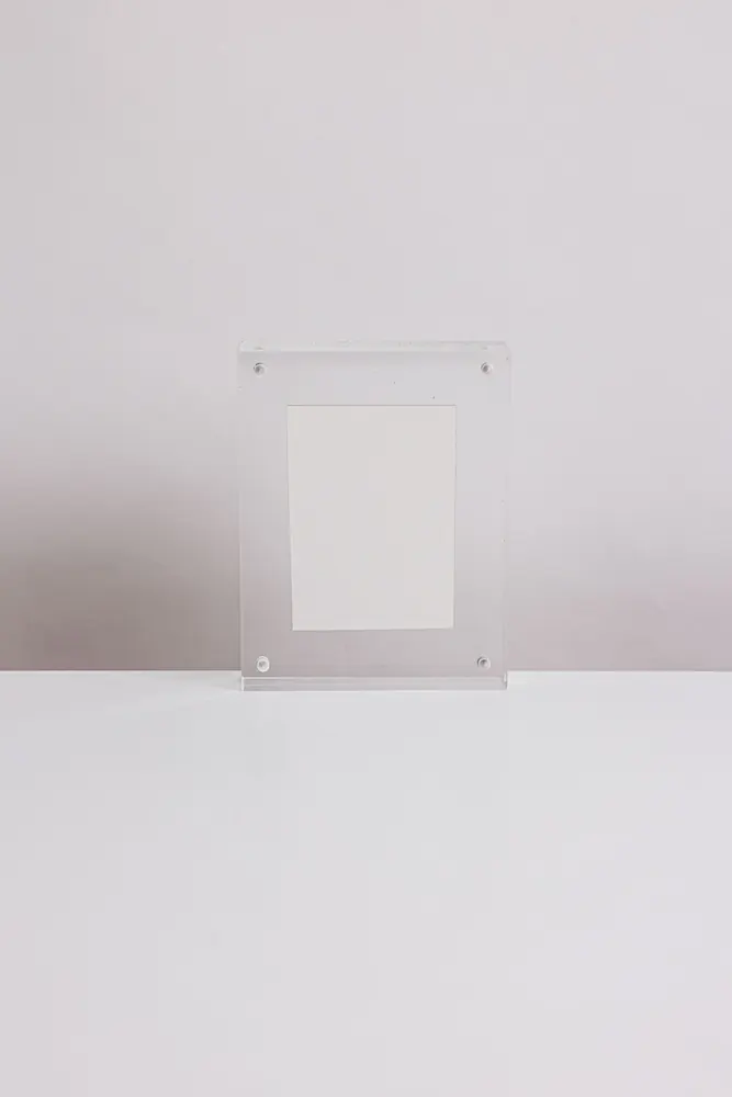 Clear acrylic display material and product presentation frame